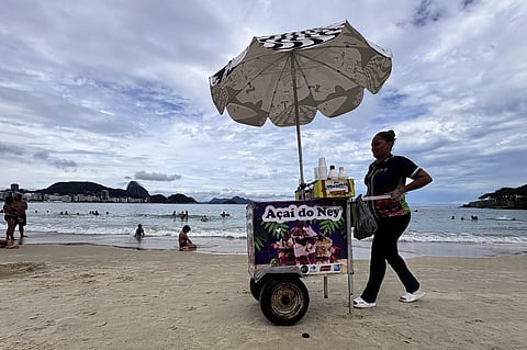 A STREET vendor sells acai berry juice at Copacabana beach in Rio de Janeiro, Brazil on 24 January 2026.