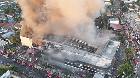 AN aerial view shows the massive fire that broke out at a major superstore in Fairview, Novaliches, Quezon City in the early hours of Wednesday.