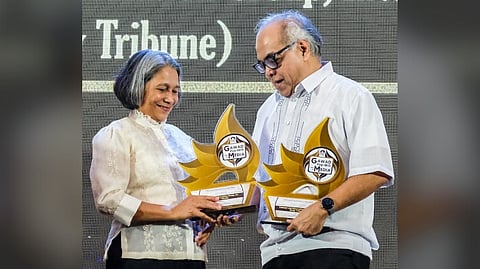 DAILY TRIBUNE executive editor Chito Lozada receives two awards — Bida Sa Pagbabalita (Most Number of Onsite and Social Media Platforms with published PRs) and Kabalikat Sa Pagbabalita (Most Number of Published Press Releases on its online news site) — on behalf of the publication from Marilene C. Acosta, chief executive officer of the Pag-IBIG Fund, during the Gawad Pag-IBIG para sa Media this afternoon at The Manila Hotel.