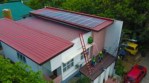 SOLAR distributors install solar panels on the roof of a home in Metro Manila. The Department of Energy, the Department of the Interior and Local Government, the Department of Public Works and Highways, and some local government units released a Joint Memorandum Circular to allow Filipino households and businesses faster and easier access to solar power credits under the government’s Net-Metering Program.
