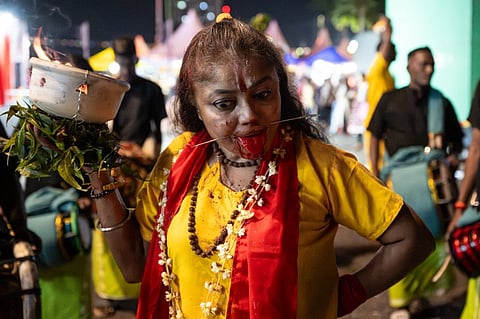 A HINDU devotee in a state of trance reacts before climbing the 272 steps to the Batu Caves temple to make offerings during the Thaipusam festival at Batu Caves on the outskirts of Kuala Lumpur on 1 February 2026.