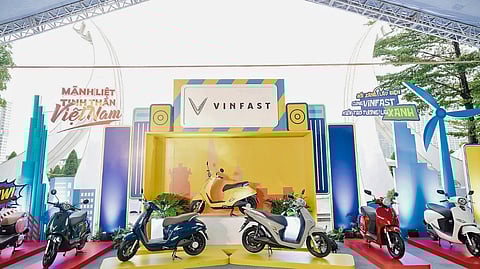 DISPLAY shows VinFast electric scooters lined up at a public showcase, which highlights the brand’s expanding two-wheeler lineup in Vietnam.