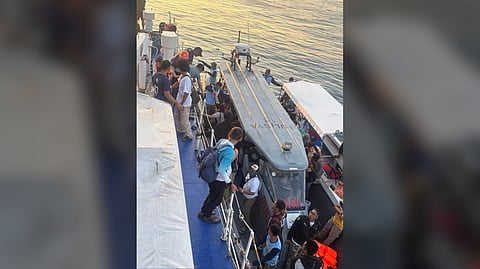 MEMBERS of the Philippine Coast Guard respond to a maritime incident involving a distressed vessel with 210 passengers and 15 crew members near Pangasahan Island, Basilan.