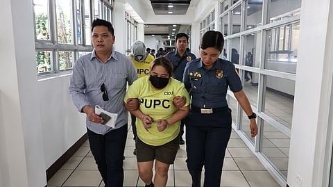 THE suspects in the killing of Police Senior Master Sergeant Diane Mollenido and her son are turned over to Camp Crame, Quezon City on Tuesday.