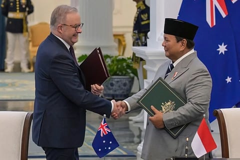 DEAL SEALED Indonesian President Prabowo Subianto (right) and Australian Prime Minister Anthony Albanese shake hands after signing a cooperation agreement at the Merdeka Palace in Indonesia’s capital Jakarta on Feb. 6, 2026.