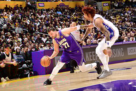 LUKA Doncic does his thing just before being pulled out of the game in the Los Angeles Lakers’ 119-115 win over the Philadelphia 76ers in the NBA regular season.