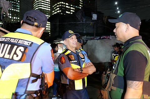 Quezon City Police District Police Brig. Gen. Randy Glenn Silvio leading the Oplan Bulabog operations at Barangay Sitio San Roque, Barangay Bagong Pag-asa in Quezon City this Saturday night.