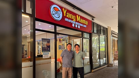 WILSON and Henry Uy, owners of Yang Mama Seafood Restaurant in Seascape Village.