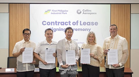 Collins Aerospace and FPIP officials show the signed agreement for the expansion of Collins Aerospace’s area at FPIP. They are (from left) Manuel S. Lizardo Jr. head of FPIP business development and corporate services group; Victor Z. Montinola, head of FPIP land acquisition group; Yutaro Kuryu, FPIP senior vice president and head of industrial business group; Mary DeStaffan, general manager of Collins Aerospace’s Philippine campus; and Alan Hall, finance director of Collins Aerospace.