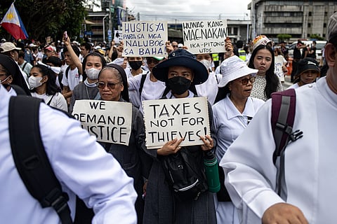 PROTESTERS from various anti-corruption groups march at the EDSA People Power Monument in Quezon City on 21 September 2025 during the ‘Trillion Peso March,’ demanding accountability amid allegations of widespread corruption under the Marcos Jr. administration. Another one will be held later this month.