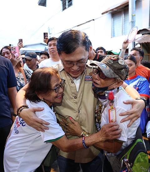 SENATOR Christopher “Bong” Go meets displaced residents in Barangay 76-A to assess needs and provide relief.