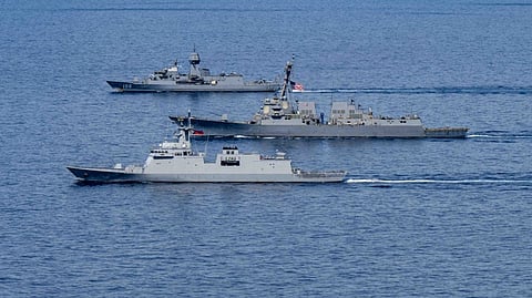 Chinese ships spy on trilateral drills