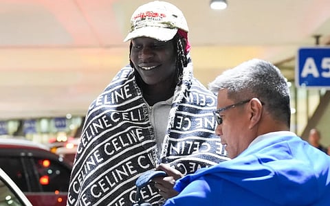 FORMER NBA standout Bol Bol gets a warm welcome from team manager Jojo Lastimosa as he arrives in Manila to play for TNT Tropang 5G in the PBA Commissioner’s Cup.