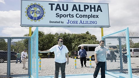 DHSUD Secretary Jose Ramon Aliling (left) and UPLB Chancellor Jose Camacho Jr. (right) lead the opening of the newly inaugurated Tau Alpha Sports Complex at the UPLB.