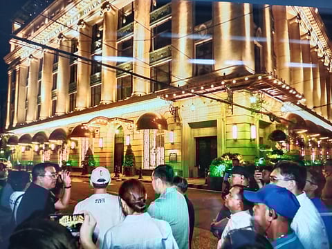Manila Mayor Isko Moreno leads the ceremonial lighting of the restored Juan Luna Building facade in Binondo, highlighting efforts to preserve the capital’s American-era architectural heritage.