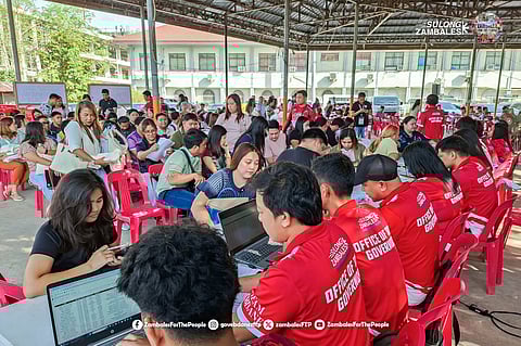 APPLICANTS wait their turn to file their requirements for postgraduate degree financial assistance under the Handog Edukasyon of the Provincial Government at the Capitol Grounds in Iba, Zambales on 20 February 2026.