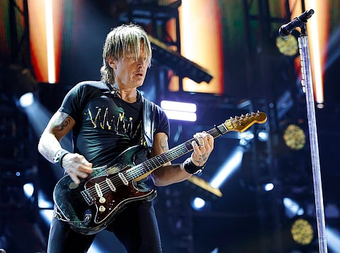 Keith Urban performs on tour amid reports he has parted ways with his longtime management team following his divorce from Nicole Kidman.