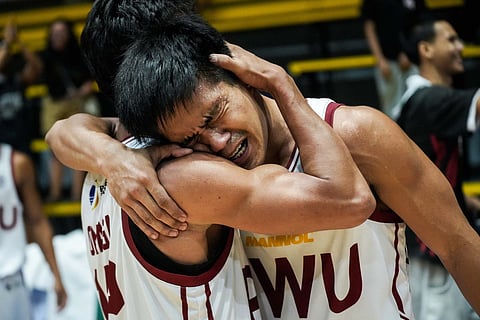 A PHILIPPINE Women’s University player breaks down in tears after posting a 74-73 win over Immaculada Concepcion College in the PGFlex-UCAL Season 8 basketball tournament.