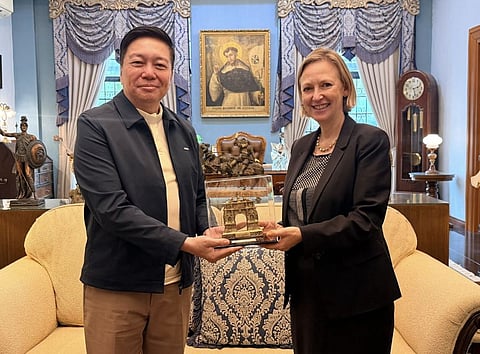 SWEDEN Ambassador to the Philippines Anna Ferry (right) receives a miniature of the Arch of the Centuries, a National Cultural Treasure within the University of Santo Tomas campus, from UST Rector Very Rev. Fr. Richard Ang, O.P., Ph.D., during her visit to the Manila university.