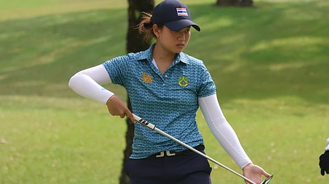 TANJIRA Issaraphon of Thailand studies the line of her putt during the second round of the Philippine Ladies Open at Manila Golf Club on Wednesday.