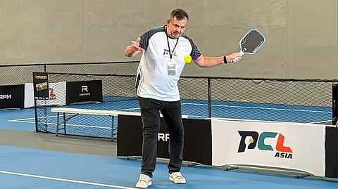 RICHARD ‘Dickie’ Bachmann, operations director of Kosmas Athletic Ventures Corp., takes center court with paddle in hand during the opening of the Pickleball Champions League Asia Rising Stars U19 Sectional Tournament in Davao City.