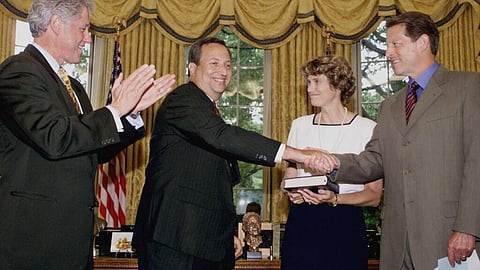 SUMMERS (2-L), who ran the US Treasury under President Bill Clinton (L), was revealed in the Epstein files released by the US Department of Justice to have had extensive exchanges with the now deceased financier