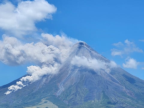 Mayon Volcano in Albay emitting smoke at 10:55 a.m. this Thursday morning.