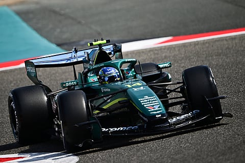 FERNANDO Alonso puts the Aston Martin through its paces during pre-season running at the Bahrain International Circuit in Sakhir.