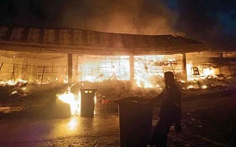 RESIDENTS and firefighters race against time to douse the blaze that razed a section of the Zamboanga Public Market.