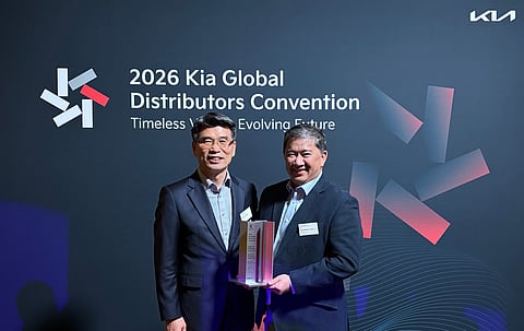KIA president and CEO Ho Sung Song (left) presents the Asia Pacific Regional Distributor of the Year award to Kia Philippines managing director Jay Lopez at the 2026 Kia Global Distributors Convention in Australia.