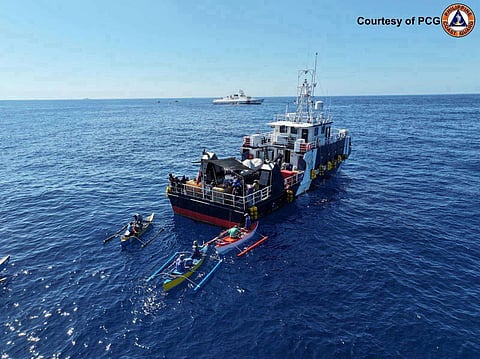 PHILIPPINE Coast Guard and BFAR vessels escort and support Filipino fishermen at Bajo de Masinloc and Escoda Shoal, providing fuel, supplies, and security amid reported harassment by Chinese maritime forces.