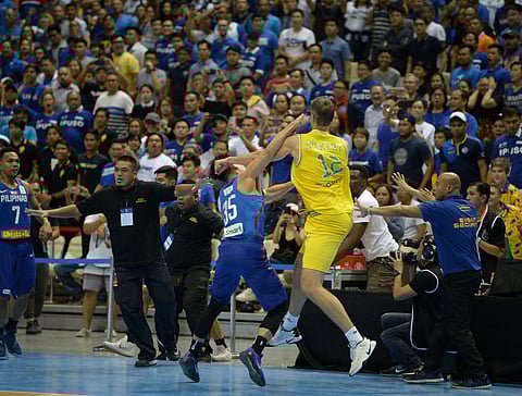 DANIEL Kickert of Australia trades punches with Matthew Wright of Gilas Pilipinas during their 2019 FIBA World Cup Asian Qualifiers match on 2 July 2018 at the Philippine Arena in Bulacan.