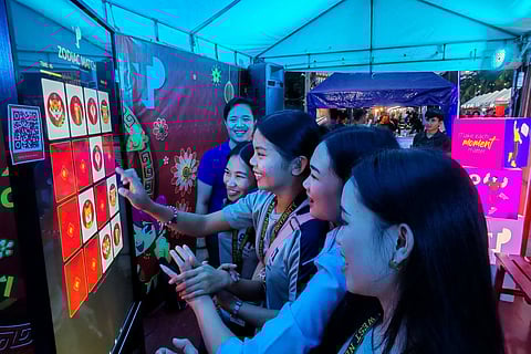 FESTIVALGOERS flocked to TP’s Bacolaodiat booth throughout the three-day festival to try their luck at the immersive games, have their fortunes read, and have their photos taken as souvenirs for the festive celebration of Chinese New Year in the heart of Bacolod.