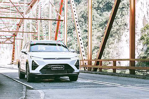 CHEVROLET Captiva EV moves across a steel bridge as the brand begins its electric push in the Philippines.