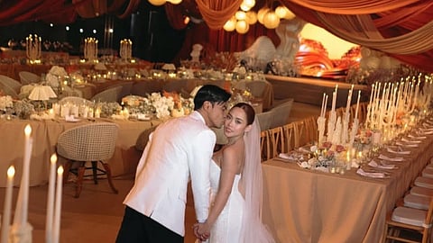 THE newlyweds Kim Molina and Jerald Napoles exchanged vows in a seaside ceremony attended by family, friends, and colleagues.