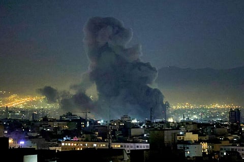 Smoke plumes rise following missile strikes in Tehran on March 1, 2026. The United States and Israel launched strikes against Iran on February 28, killing Iran’s supreme leader and top military leaders, prompting authorities to retaliate with strikes on Israel and US bases across the Gulf.