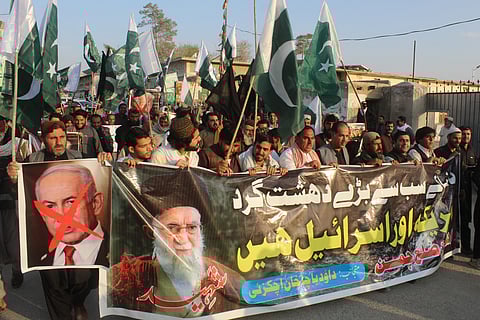 Pakistanis march during an anti US-Israel protest in Chaman on March 3, 2026 after the death of Iran's supreme leader Ayatollah Ali Khamenei amid US-Israel strikes.