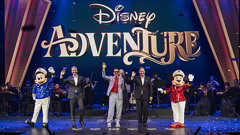 Mickey, Disney CEO Josh D’Amaro, Robert Downey Jr., Disney Signature Experiences president Joe Schott and Minnie Mouse.