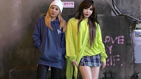Sandara Park and Park Bom.