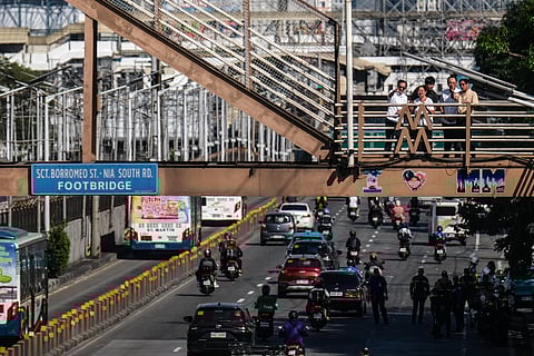 Still a daunting effort President Ferdinand R. Marcos Jr., First Lady Liza Araneta-Marcos, Vinny Marcos, Transportation Secretary Giovanni Lopez and Public Works Secretary Vince Dizon inspect the new Kamuning Footbridge and Busway Station along EDSA in Quezon City on Thursday. Built to replace the notorious 154-step ‘Mt. Kamuning,’ the new bridge promises a friendlier climb, though commuters may still want to stretch first.