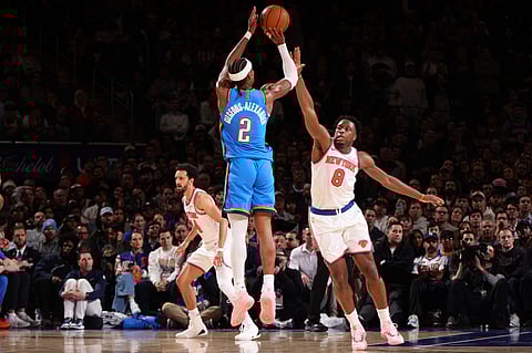 SHAI Gilgeous-Alexander shoots the crucial three-pointer that lifted the Oklahoma City Thunder to a 103-100 victory over the New York Knicks in the NBA regular season.