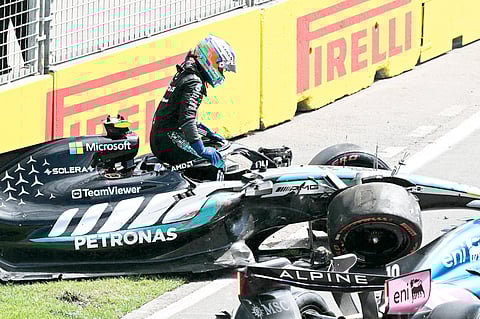 KIMI Antonelli climbs out of his Mercedes after crashing during the third practice session for the Formula One at Albert Park in Melbourne.