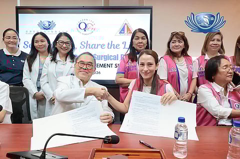 TZU Chi Medical Foundation Philippines president Dr. Antonio Say and Quezon City Ladies Foundation president Joy Sotto shake hands after leading the signing of an agreement to screen and surgically treat Quezon City residents with eye conditions at the Tzu Chi Eye Center in Sta. Mesa, Manila on 27 February 2026.