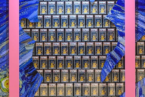 A WORLD-FIRST installation: Over 400 PSA 10-graded ‘Pikachu with Grey Felt Hat’ cards, stacked into a mosaic valued at around HK$5 million (US$641,000).