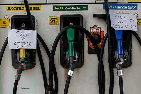 Pump stations are marked “out of stock” at a gas station in Paco, Manila, on Monday, 9 March 2026, after a surge of motorists hoarding petroleum products amid fears of price hikes due to the ongoing conflict in the Middle East.
