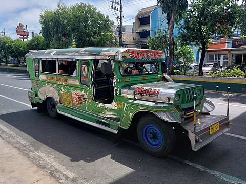A classic jeepney driving along the route of Sucat to Baclaran in Parañaque.