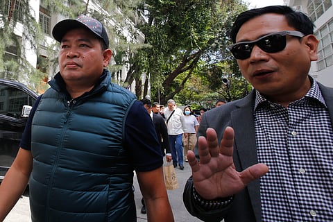 Julie "Dondon" Patidongan, a key whistleblower in the missing sabungeros case, arrives at the Department of Justice in Manila today, 09 March 2026. He remained tight-lipped regarding the reason for his visit.