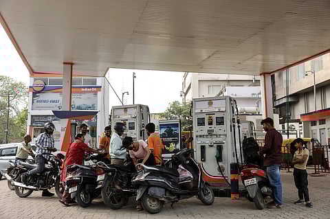 PEOPLE line up to refuel at an Indian Oil station in Varanasi, India, as rising oil prices driven by the Middle East conflict fuel frustration at petrol pumps across Asia.