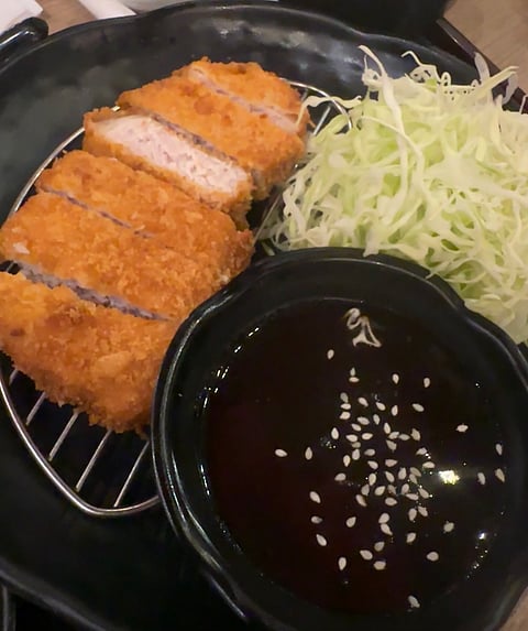 Watami’s classic Pork Katsu comes with a side of cabbage and a classic Katsu sauce.