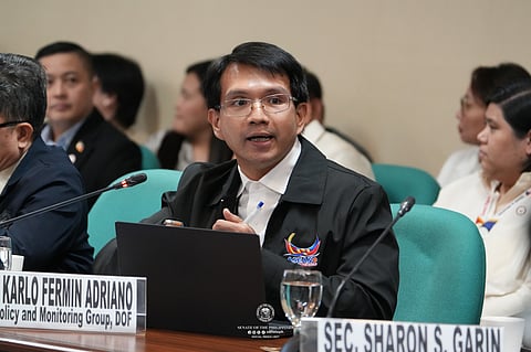DOF Undersecretary Karlo Adriano at the Senate deliberations on Wednesday, 11 March, on bills granting President Marcos Jr. emergency powers to cut excise tax and VAT amid the ongoing tensions in the Middle East.